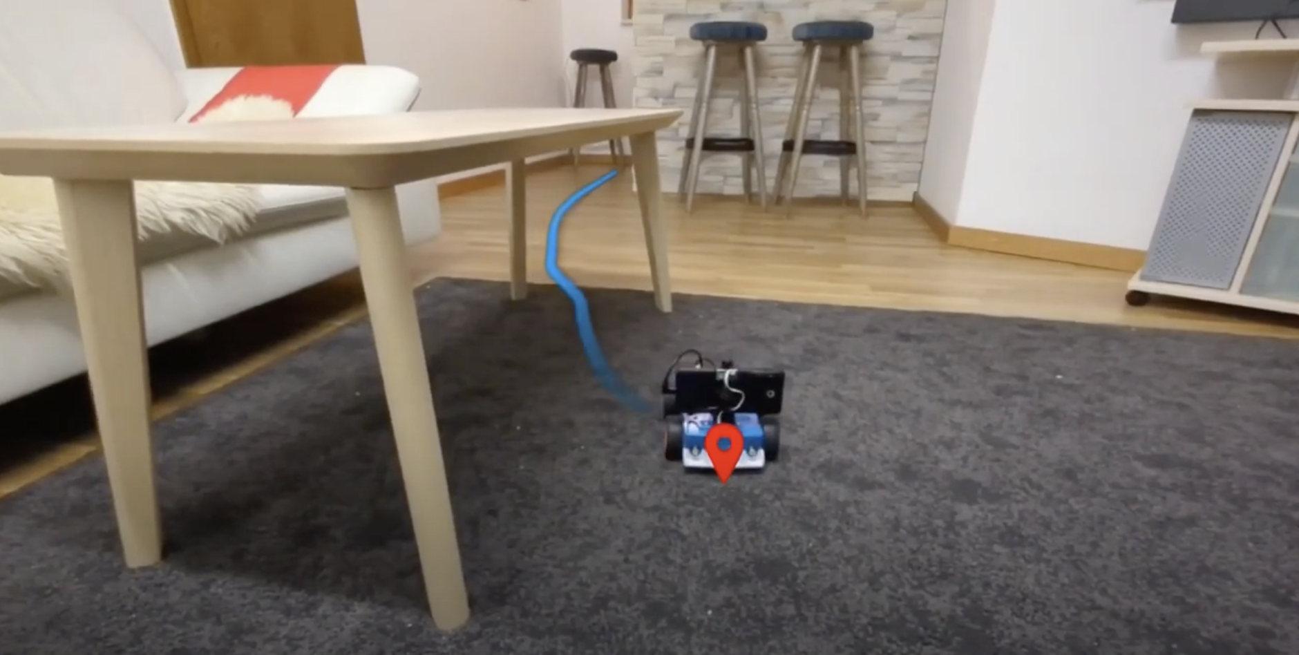 OpenBot-Fleet: A System for Collective Learning with Real Robots